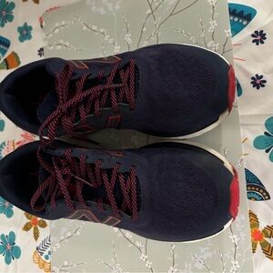 Red, blue, and white New Balance